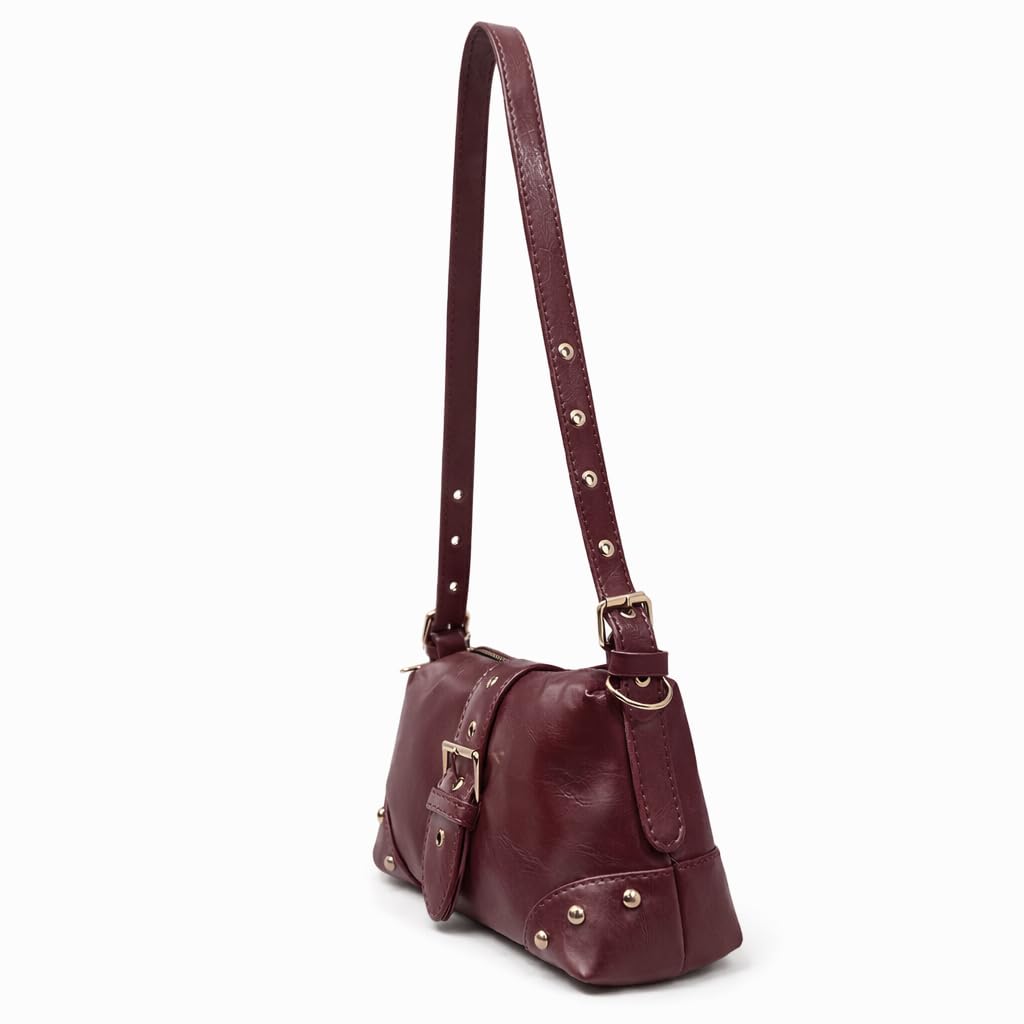 Small  women’s shoulder bag with an elegant leather buckle, featuring a top zipper and a long strap – suitable for daily outings and evening events.