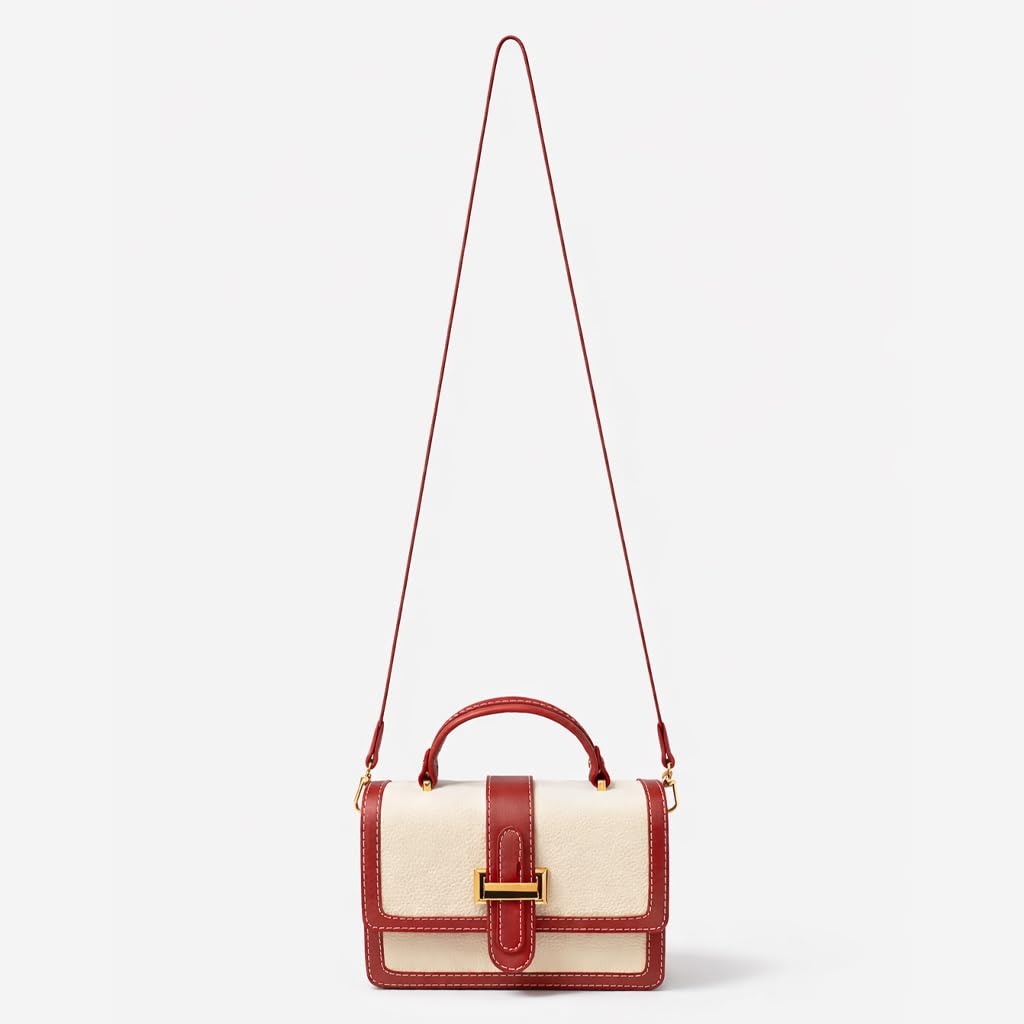 Red leather women’s handbag with a distinctive design, featuring a gold metal buckle and a top handle — suitable for work and special occasions.