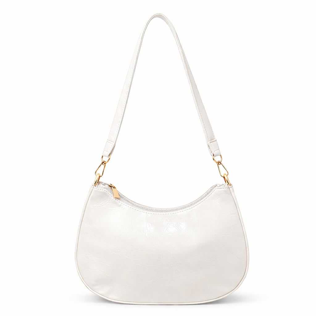 Small women’s shoulder bag decorated with gold studs, featuring a top zipper and a comfortable strap – suitable for outings and evening events.