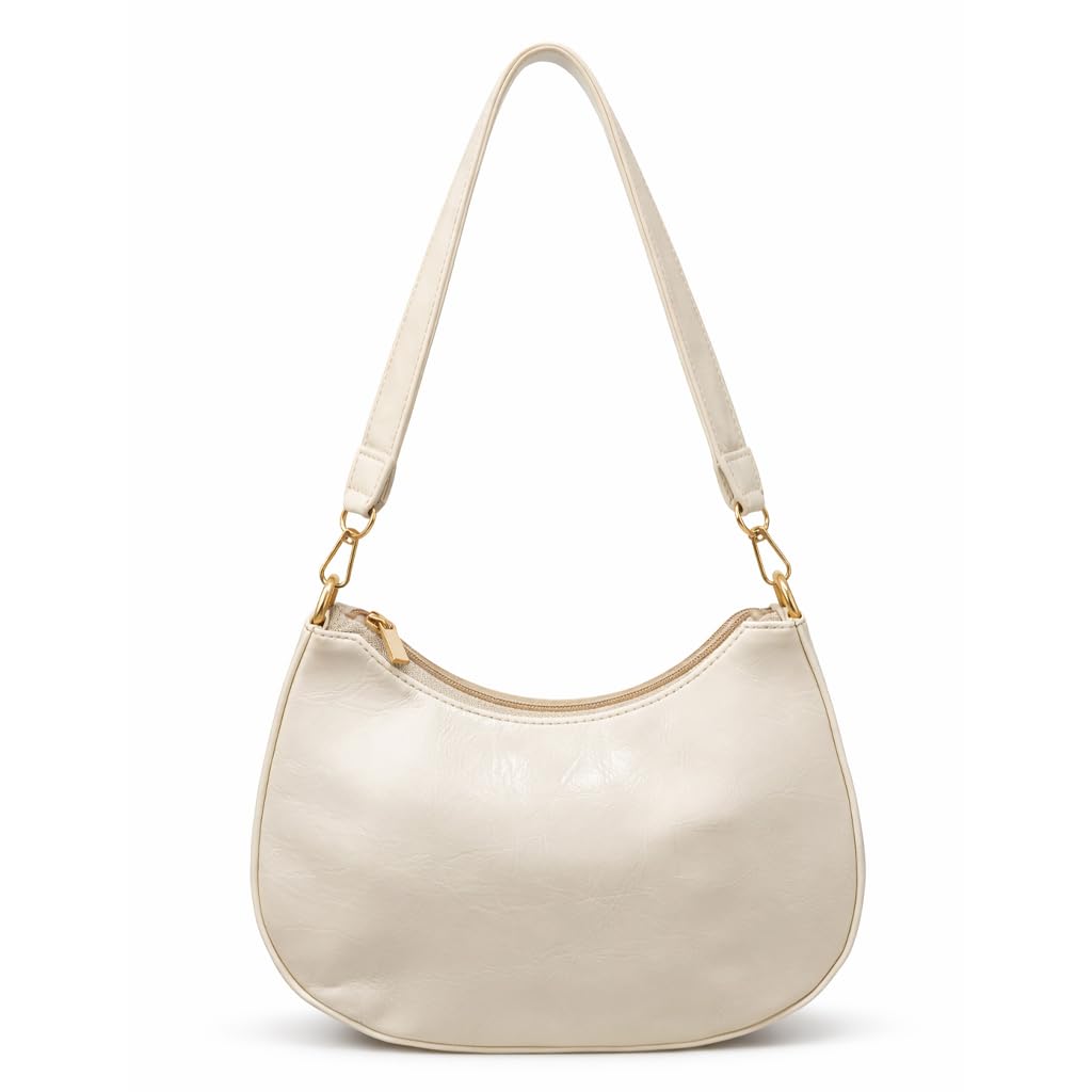 Small women’s shoulder bag decorated with gold studs, featuring a top zipper and a comfortable strap – suitable for outings and evening events.