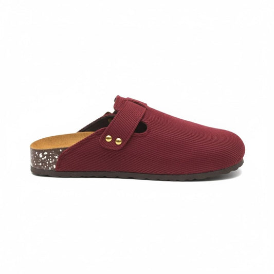 Stylish and comfortable women's clogs with a buckle closure and a non-slip sole.