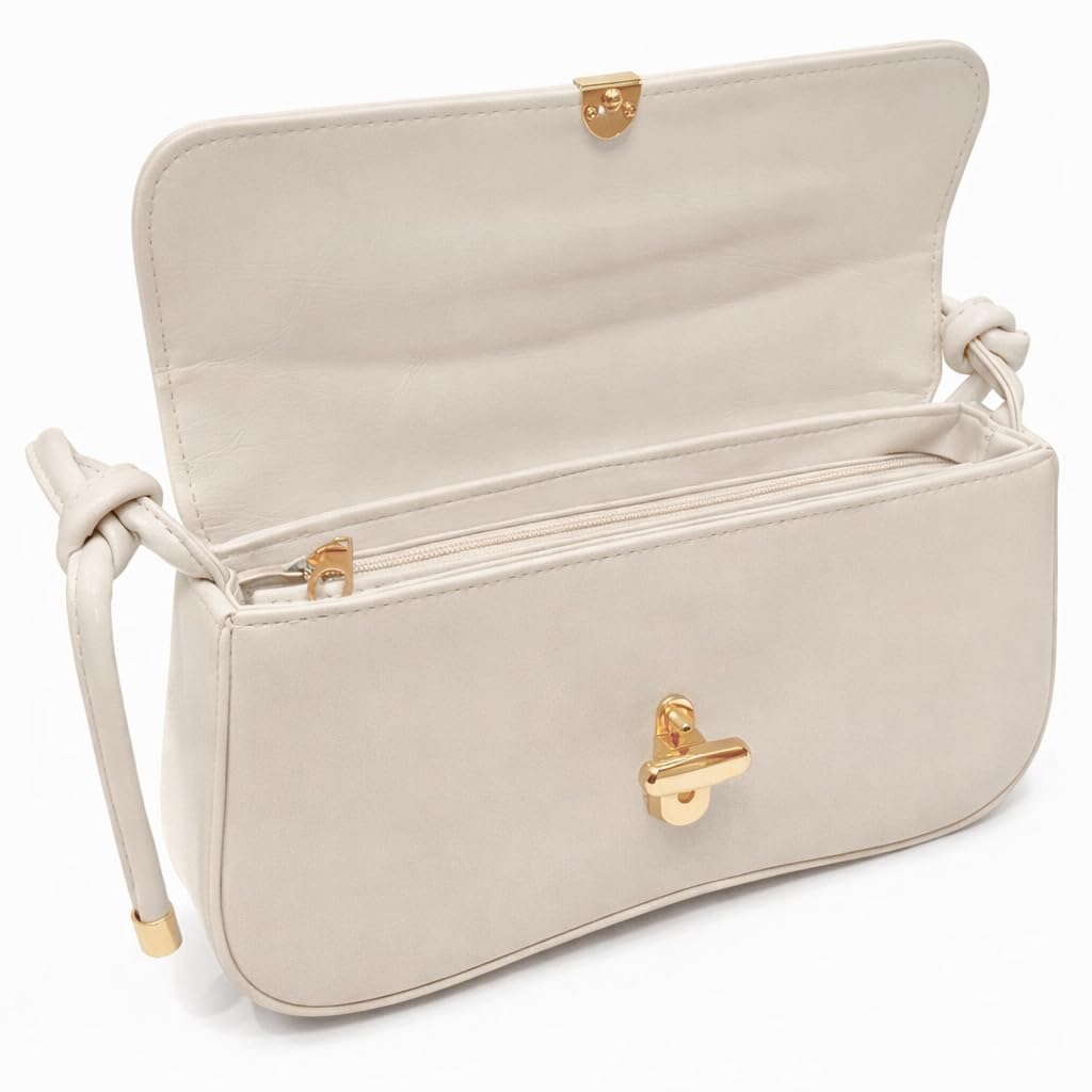 Small leather women’s handbag with a modern design and a long strap – suitable for evening events and everyday outings.