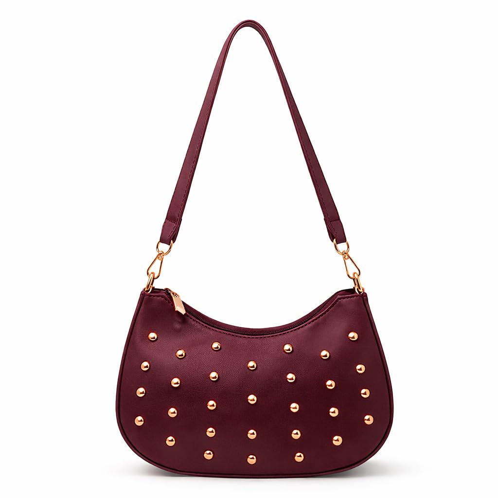 Small women’s shoulder bag decorated with gold studs, featuring a top zipper and a comfortable strap – suitable for outings and evening events.