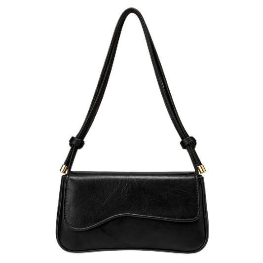 Small Cafe leather women’s handbag with a modern design and a long strap – suitable for evening events and everyday outings.