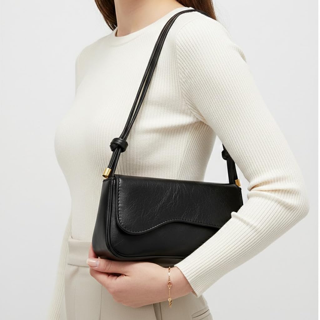 Small Cafe leather women’s handbag with a modern design and a long strap – suitable for evening events and everyday outings.