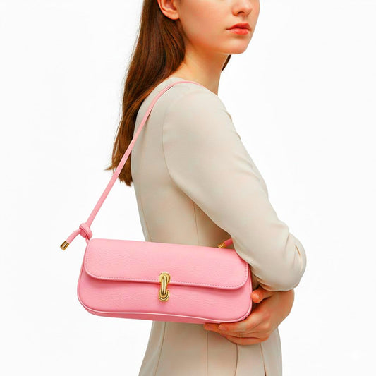 Small Pink leather women’s handbag with a modern design and a long strap – suitable for evening events and everyday outings.