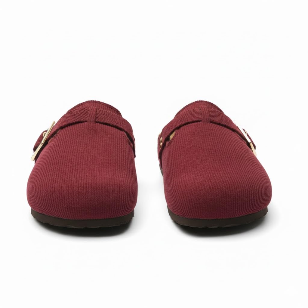 Stylish and comfortable women's clogs with a buckle closure and a non-slip sole.