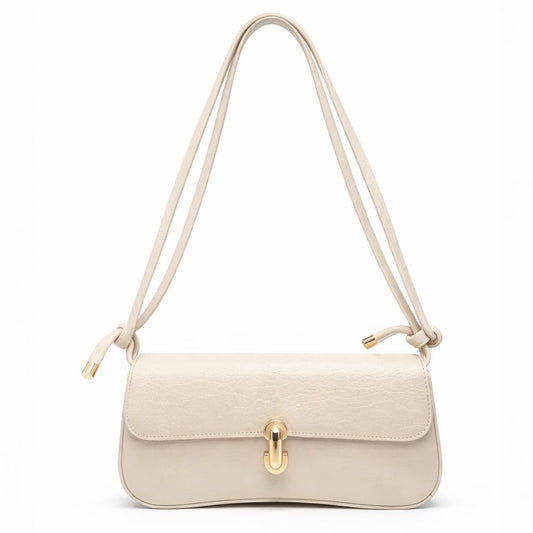 Small leather women’s handbag with a modern design and a long strap – suitable for evening events and everyday outings.