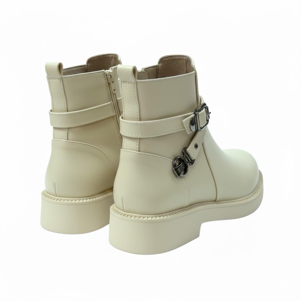 Stylish women's boots with a comfortable heel and elegant design, featuring metal straps.