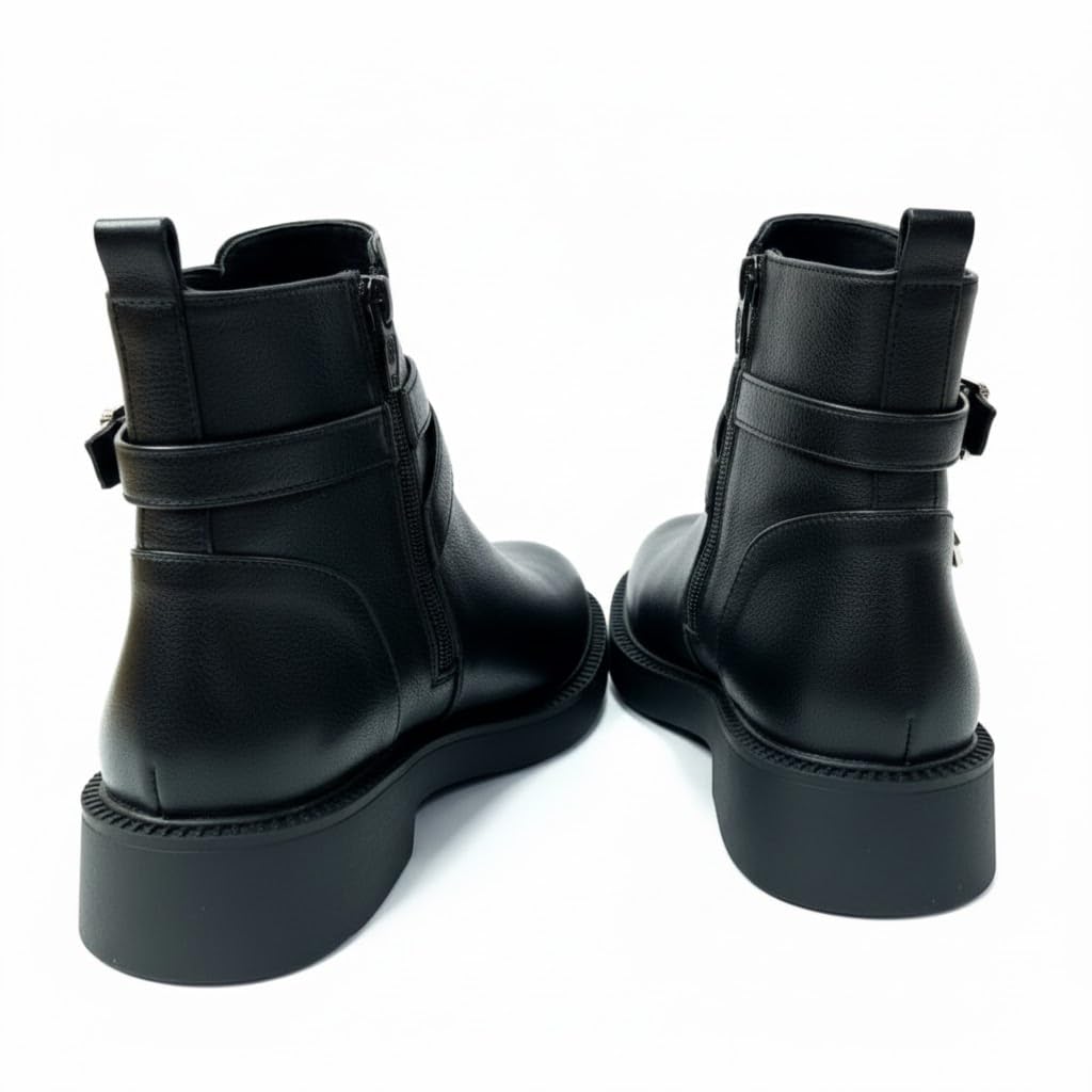 Stylish women's boots with a comfortable heel and elegant design, featuring metal straps.