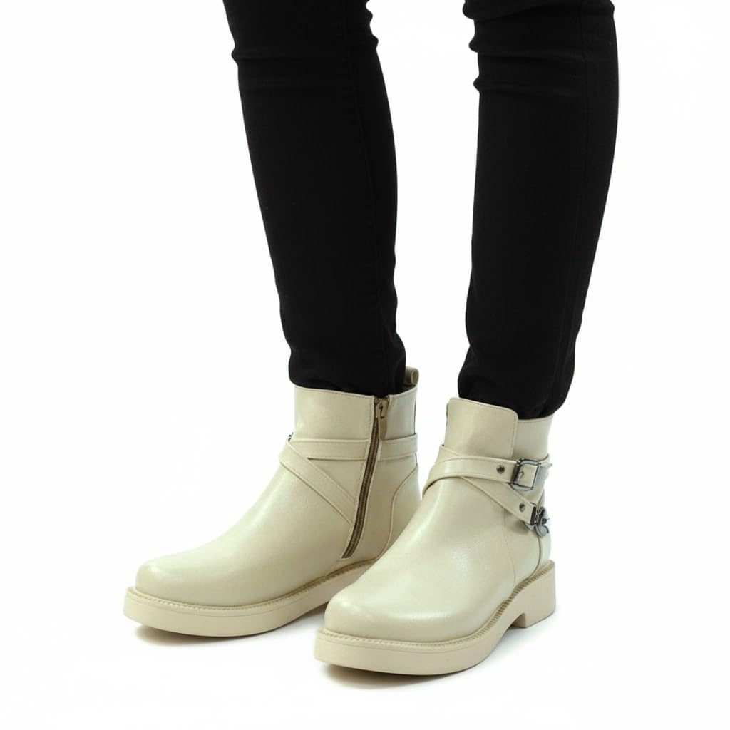Stylish women's boots with a comfortable heel and elegant design, featuring metal straps.