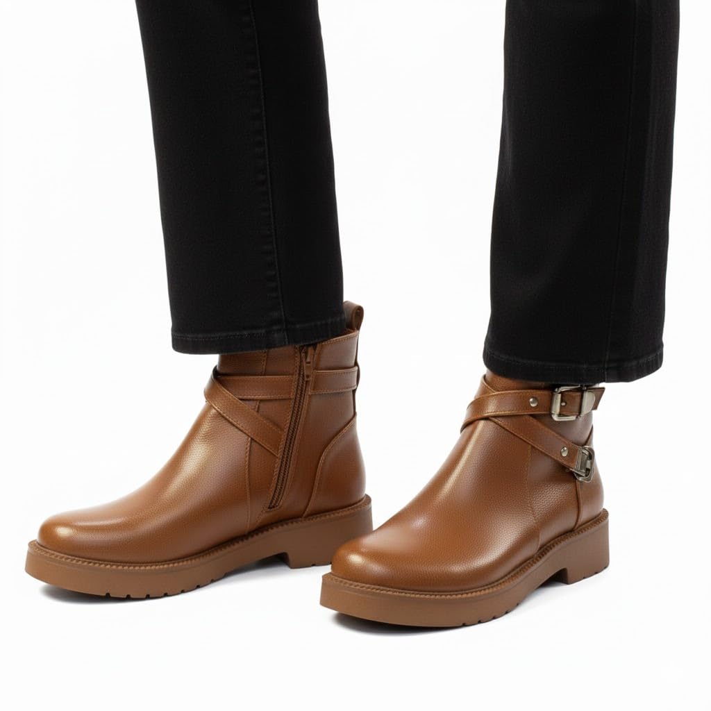 Stylish women's boots with a comfortable heel and elegant design, featuring metal straps.