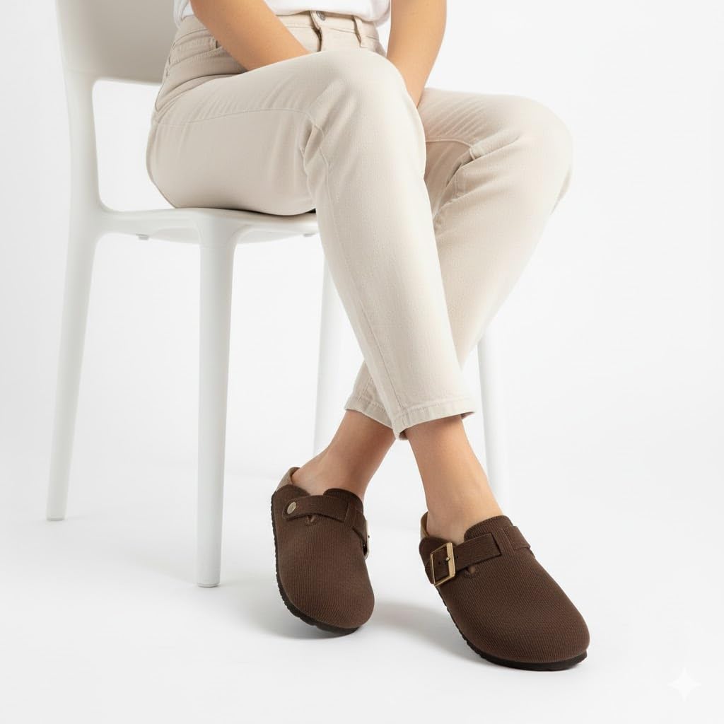 Stylish and comfortable women's clogs with a buckle closure and a non-slip sole.