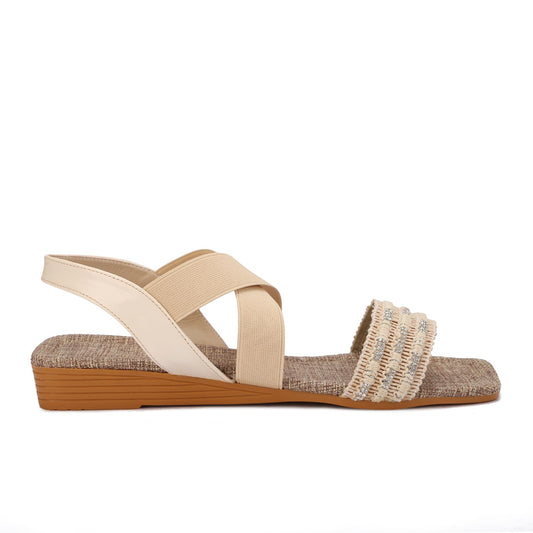 Elegant women's sandals with elastic straps and a design decorated with threads and beads.