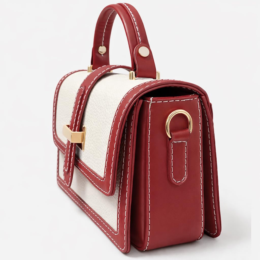 Red leather women’s handbag with a distinctive design, featuring a gold metal buckle and a top handle — suitable for work and special occasions.