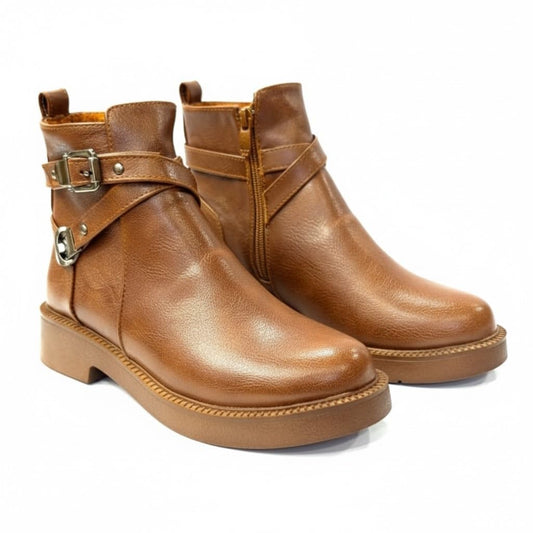 Stylish women's boots with a comfortable heel and elegant design, featuring metal straps.