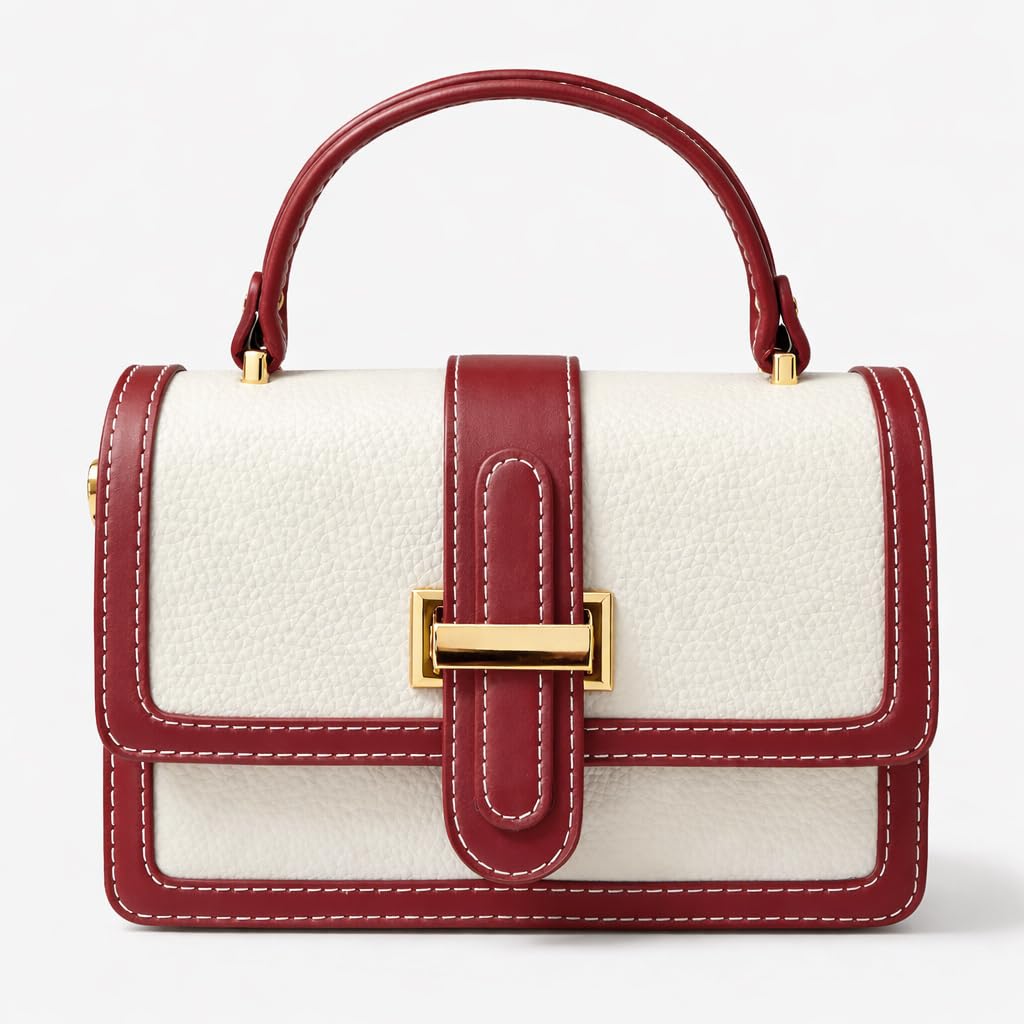 Red leather women’s handbag with a distinctive design, featuring a gold metal buckle and a top handle — suitable for work and special occasions.