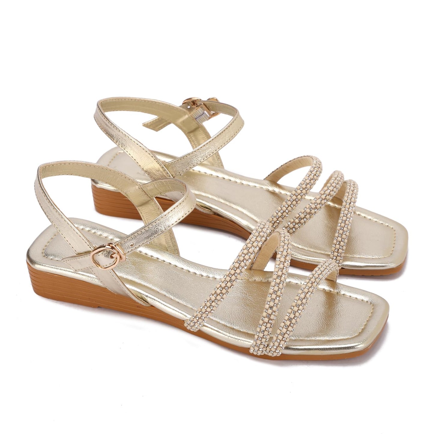 Elegant women's sandals with thin, embellished straps and a buckle design.