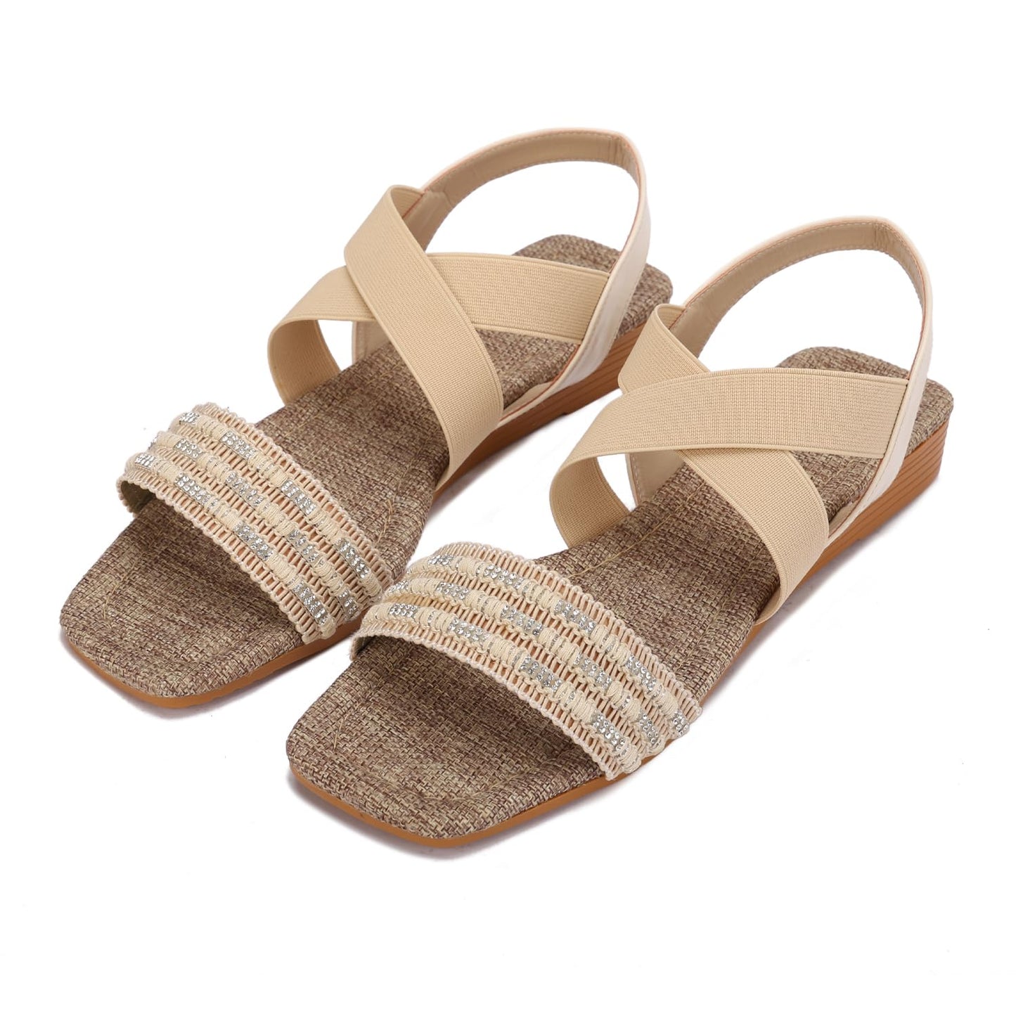 Elegant women's sandals with elastic straps and a design decorated with threads and beads.