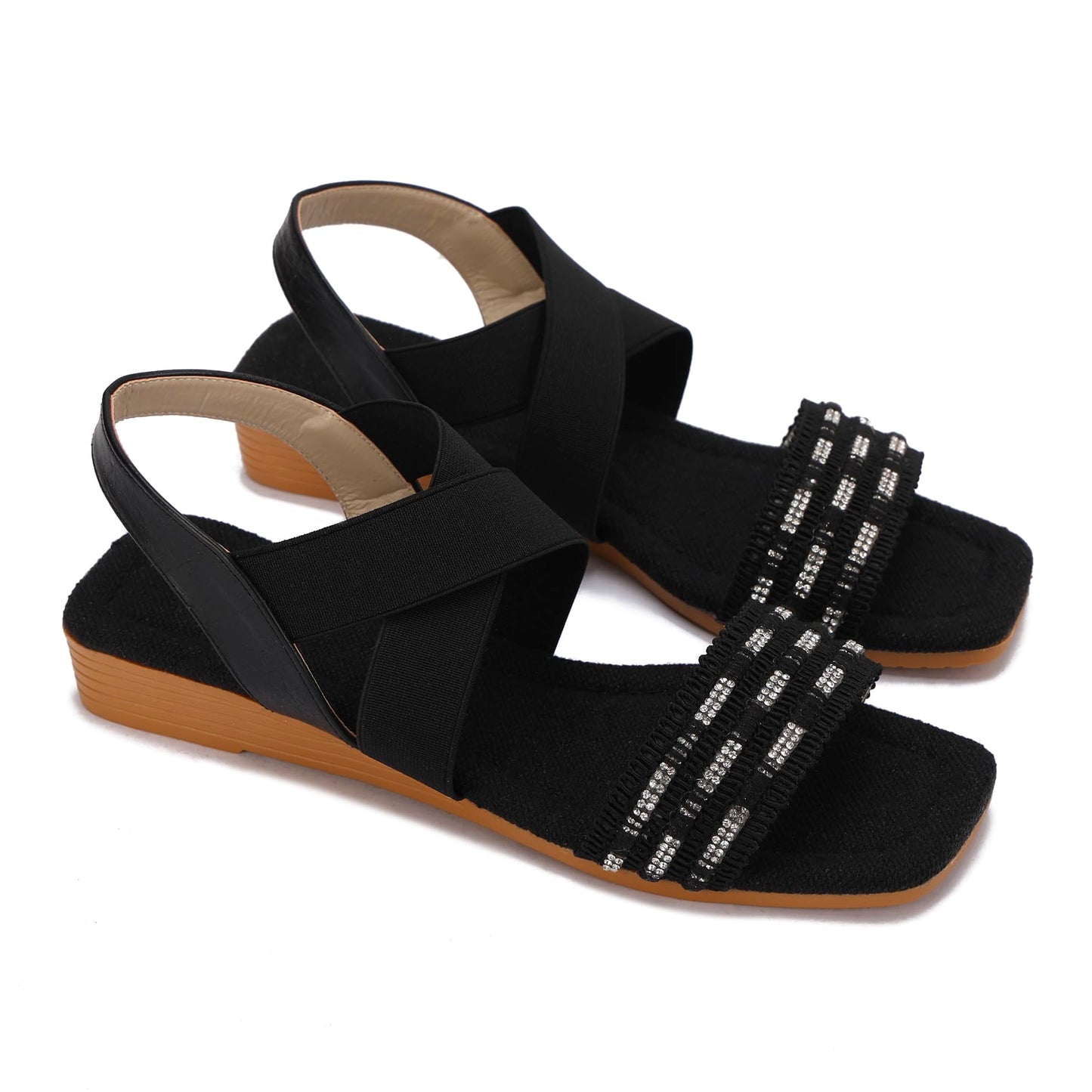 Elegant women's sandals with elastic straps and a design decorated with threads and beads.