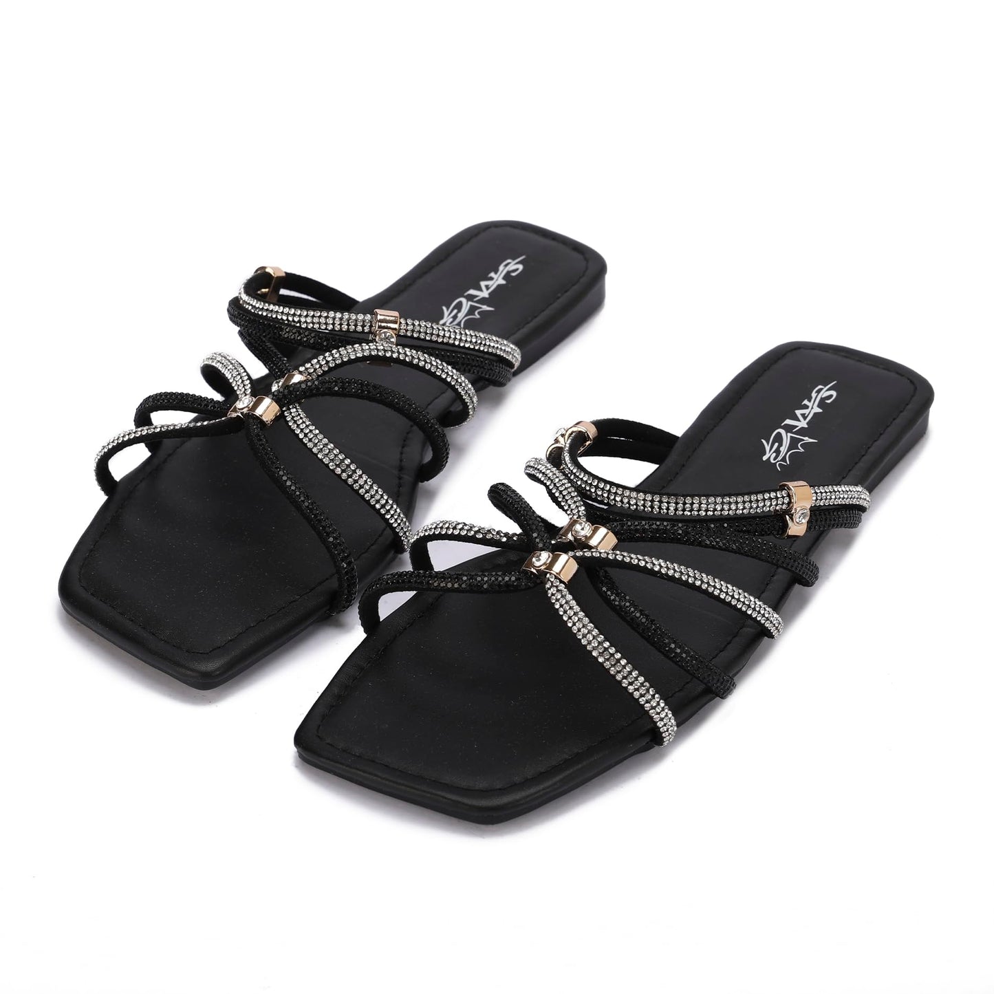 Stylish women's slippers with sparkling rhinestones and a flat heel - equipped with a comfortable sole