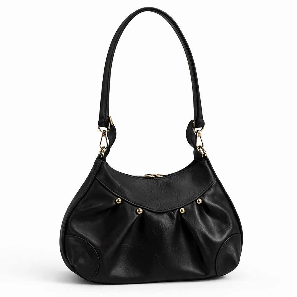 Stylish women's shoulder bag with a pleated design, featuring a bow and tassel – made of soft leather with a modern look, suitable for both formal and casual occasions.