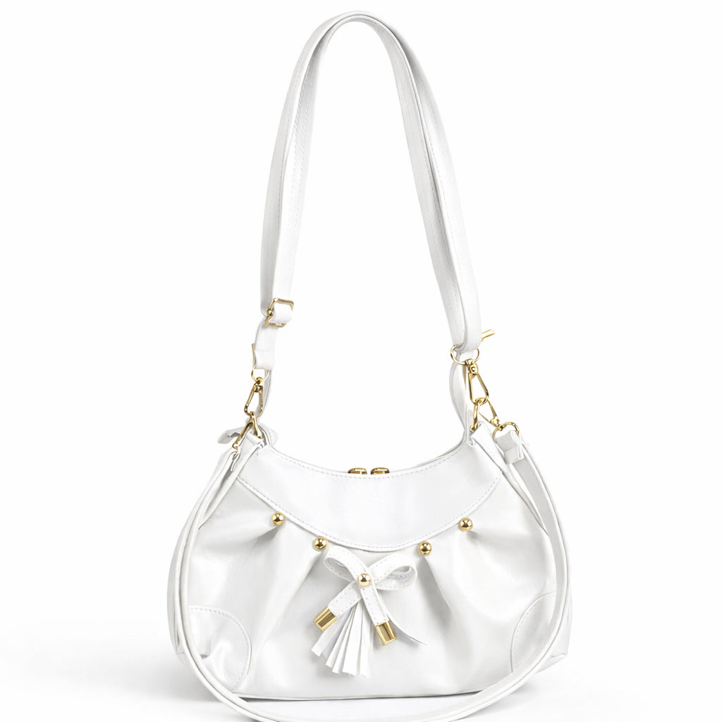 Stylish women's shoulder bag with a pleated design, featuring a bow and tassel – made of soft leather with a modern look, suitable for both formal and casual occasions.