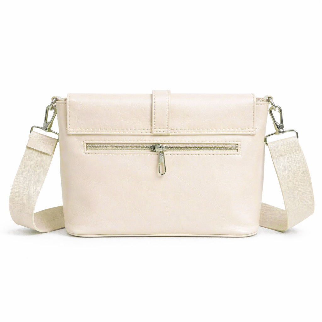 A classic women's crossbody bag in premium leather, featuring a stylish flap design, a distinctive silver metal clasp, and a wide, adjustable strap.