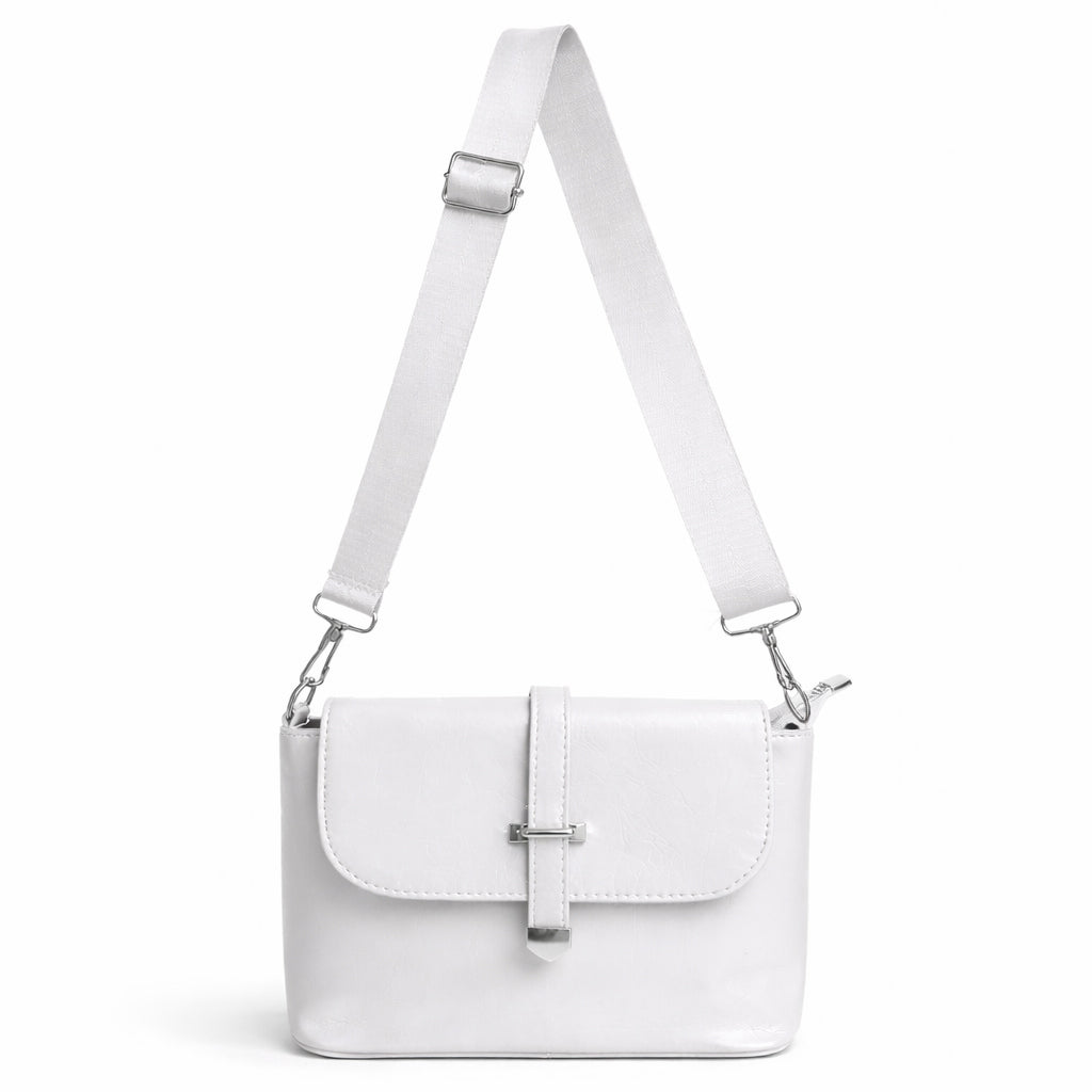 A classic women's crossbody bag in premium leather, featuring a stylish flap design, a distinctive silver metal clasp, and a wide, adjustable strap.