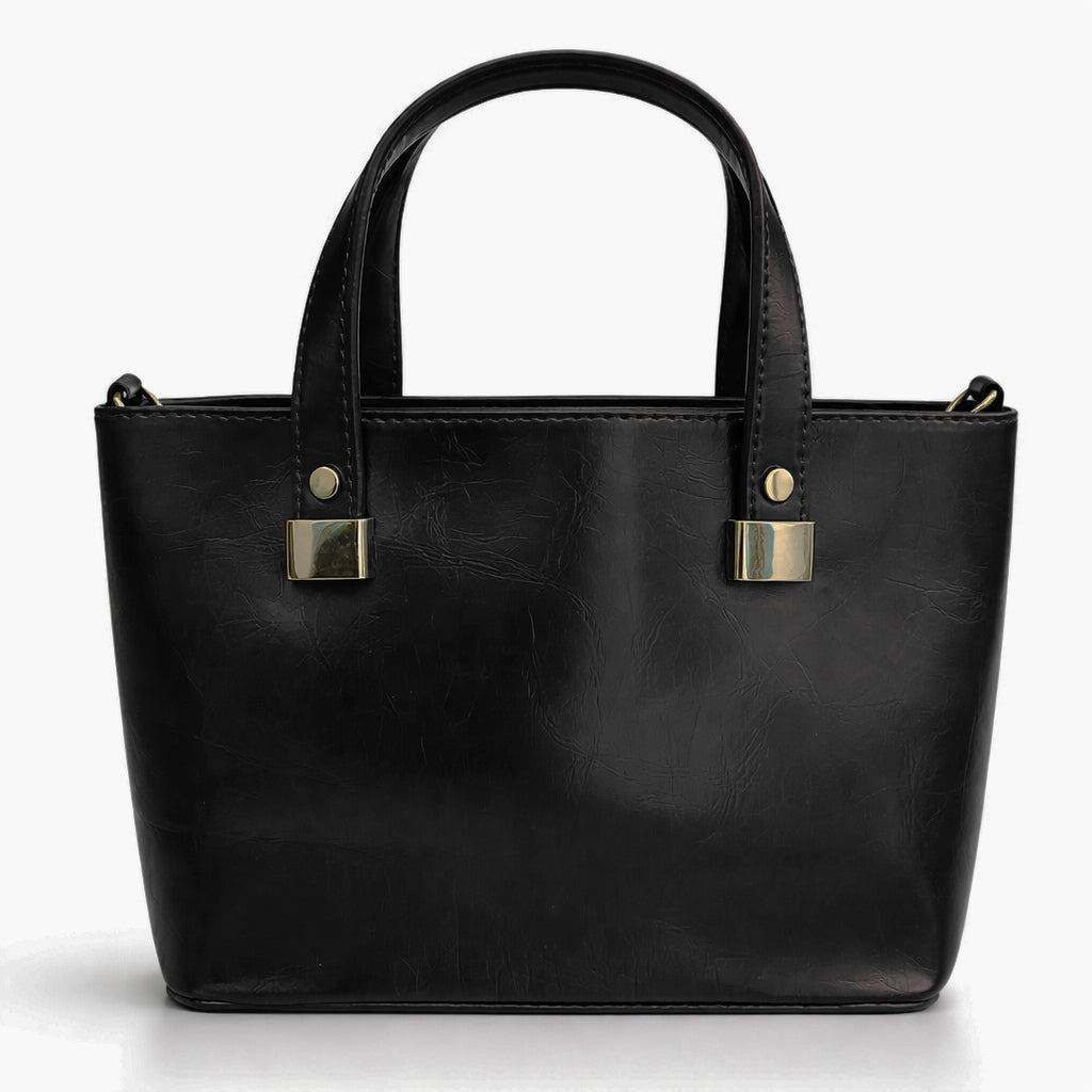 A classic women's small "tote" handbag in glossy leather - equipped with top handles and a wide, adjustable, detachable shoulder strap - stylish and practical for work and occasions.