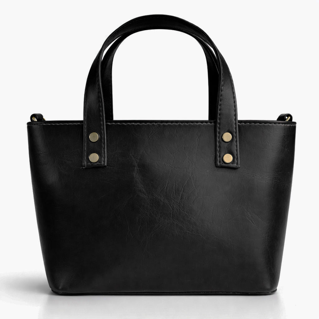 A classic women's small "tote" handbag in glossy leather - equipped with top handles and a wide, adjustable, detachable shoulder strap - stylish and practical for work and occasions.
